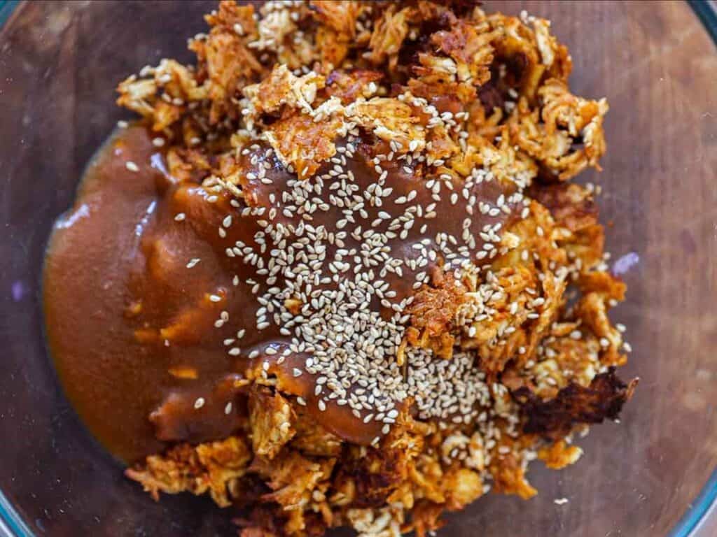 Easy Hi-Protein Vegan Lunch Meat: Korean BBQ Sandwich. 15 adding-korean-bbq-sauce-and-sesame-seeds-to-cooked-tofu