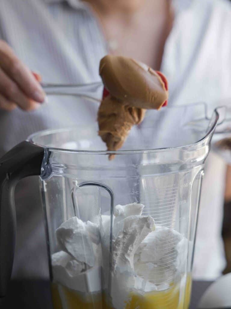 Super Easy and DELICIOUS Vegan Biscoff-Misu Recipe. 8 biscoff-cookie-butter-being-added-to-blender