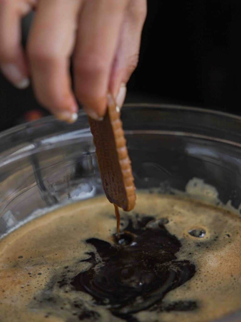 Super Easy and DELICIOUS Vegan Biscoff-Misu Recipe. 5 biscoff-cookie-with-espresso-syrup-dripping-from-bottom