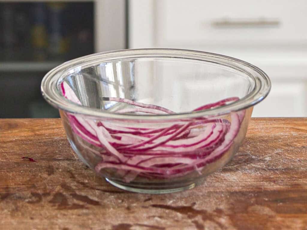 10-Minute Easy Bread Salad Recipe - Peach Panzanella. 6 bowl-or-sliced-red-onions