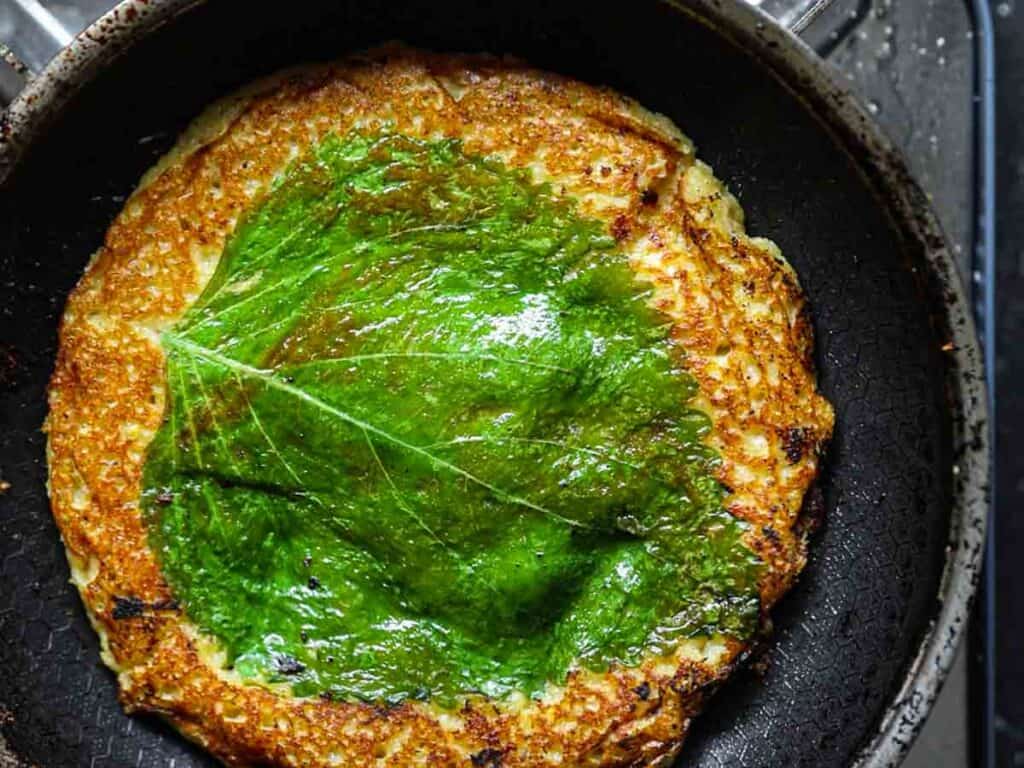Stunning Vegan Bindaetteok: Korean Mung Bean Pancakes. 12 cooked-bindaetteok-with-perilla-leaf