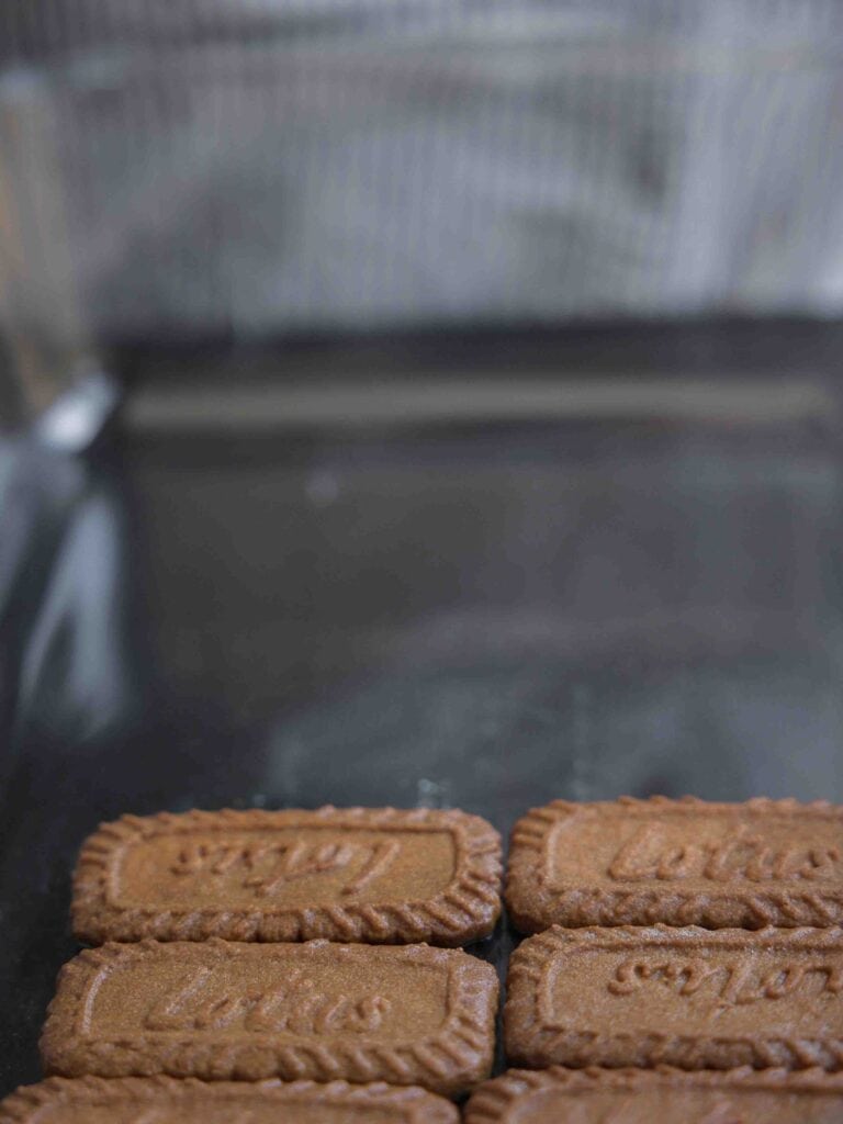 Super Easy and DELICIOUS Vegan Biscoff-Misu Recipe. 17 first-layer-of-biscoff-cookies-on-tray