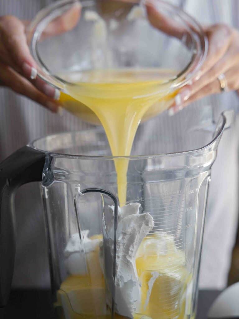 Super Easy and DELICIOUS Vegan Biscoff-Misu Recipe. 11 melted-butter-being-poured-into-blender