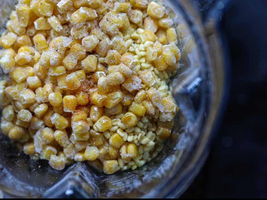 Stunning Vegan Bindaetteok: Korean Mung Bean Pancakes. 6 top-down-view-of-blender-containing-corn-mung-beans-soy-sauce-and-remaining-ingredients-for-batter