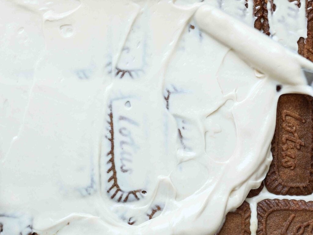 Super Easy and DELICIOUS Vegan Biscoff-Misu Recipe. 20 using-offset-spatula-to-spread-second-layer-of-cream