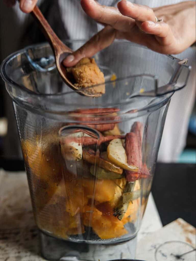 Easy and Healthy Miso & Butternut Squash Soup Recipe. 6 adding miso paste to blender