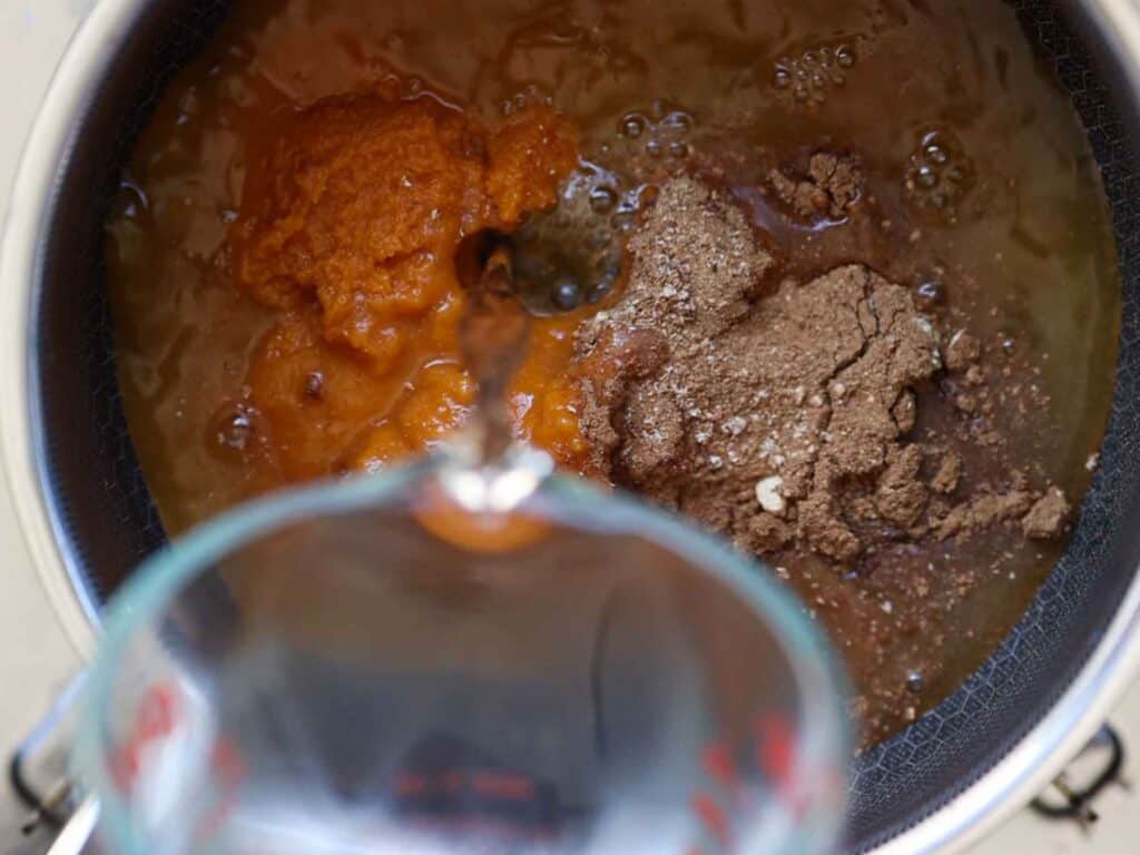 Easy Vegan Pumpkin Spice Syrup (Starbucks Copycat!). 9 adding water to pot