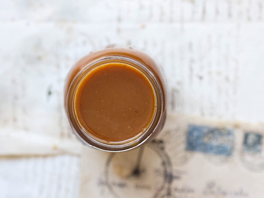 Easy Vegan Pumpkin Spice Syrup (Starbucks Copycat!). 2 top down shot of jar of vegan pumpkin spice syrup