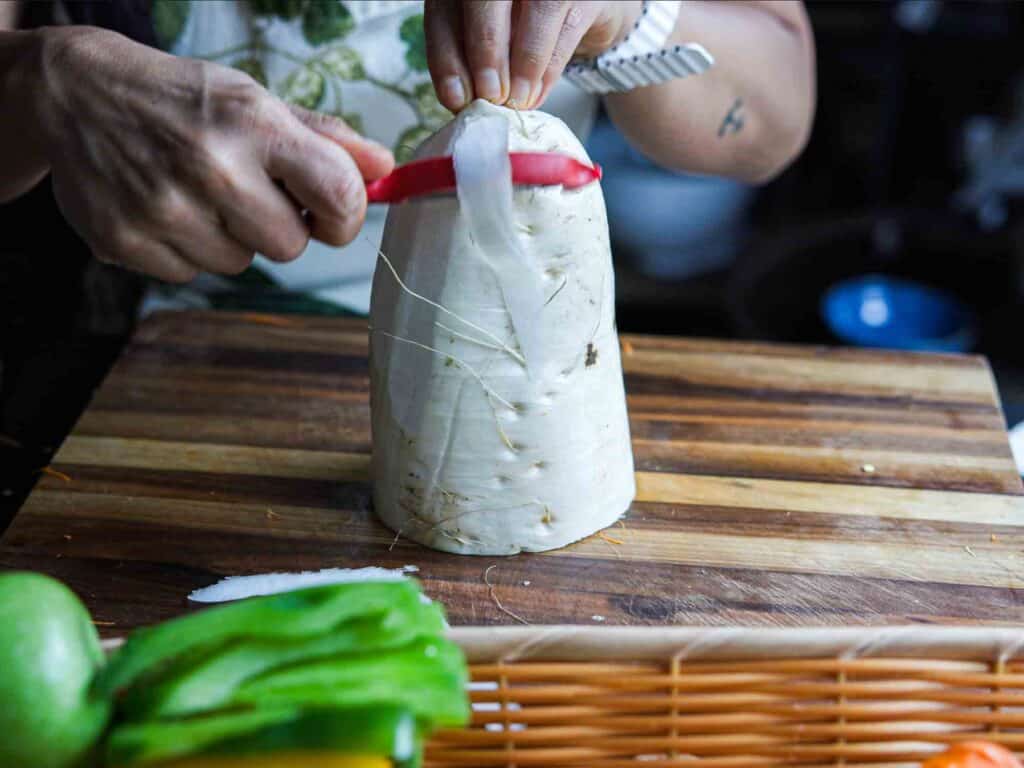 Easy & Spicy Korean Radish Salad - Musaengchae Recipe. 7 peeling korean radish