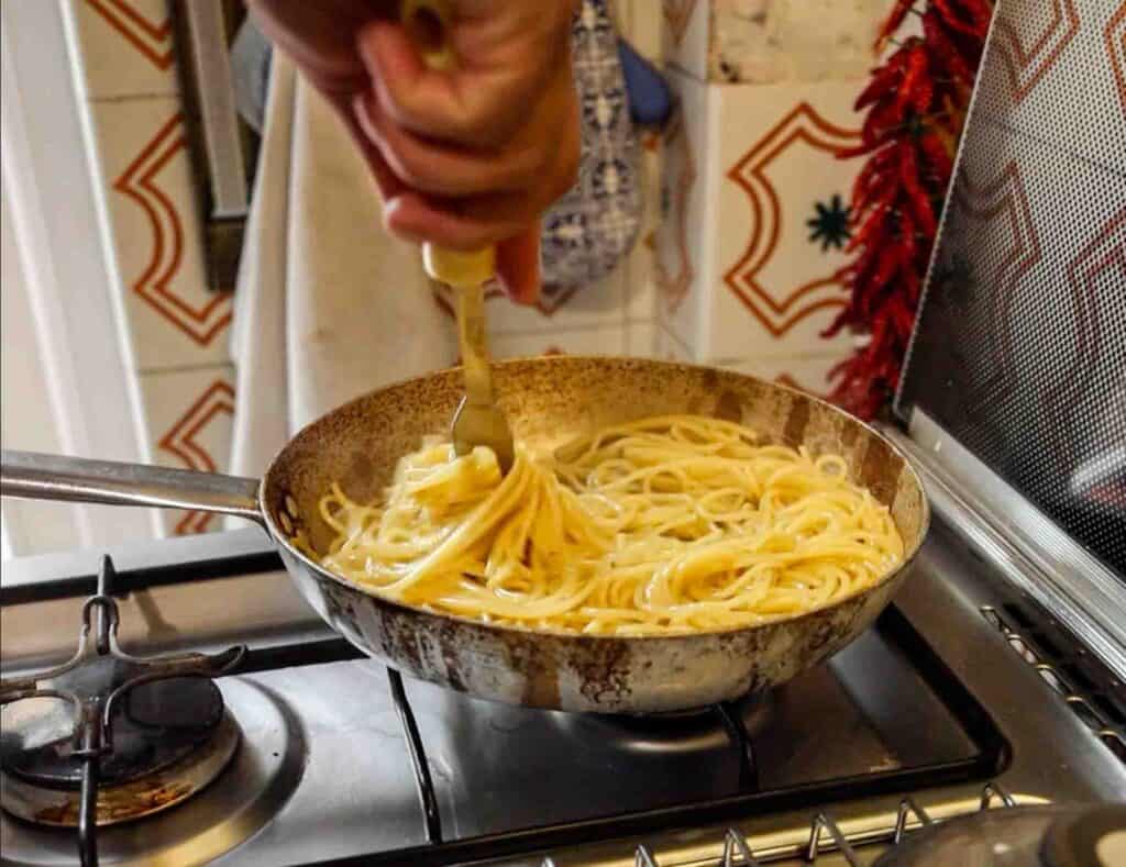 Spaghetti Aglio e Olio: The PERFECT 6-Ingredient Pasta Recipe. 15 stirring pasta for aglio e olio