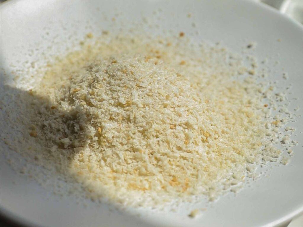 Easy Creamy and Spicy Pumpkin Ramen Recipe (Vegan). 6 close up of panko with salt