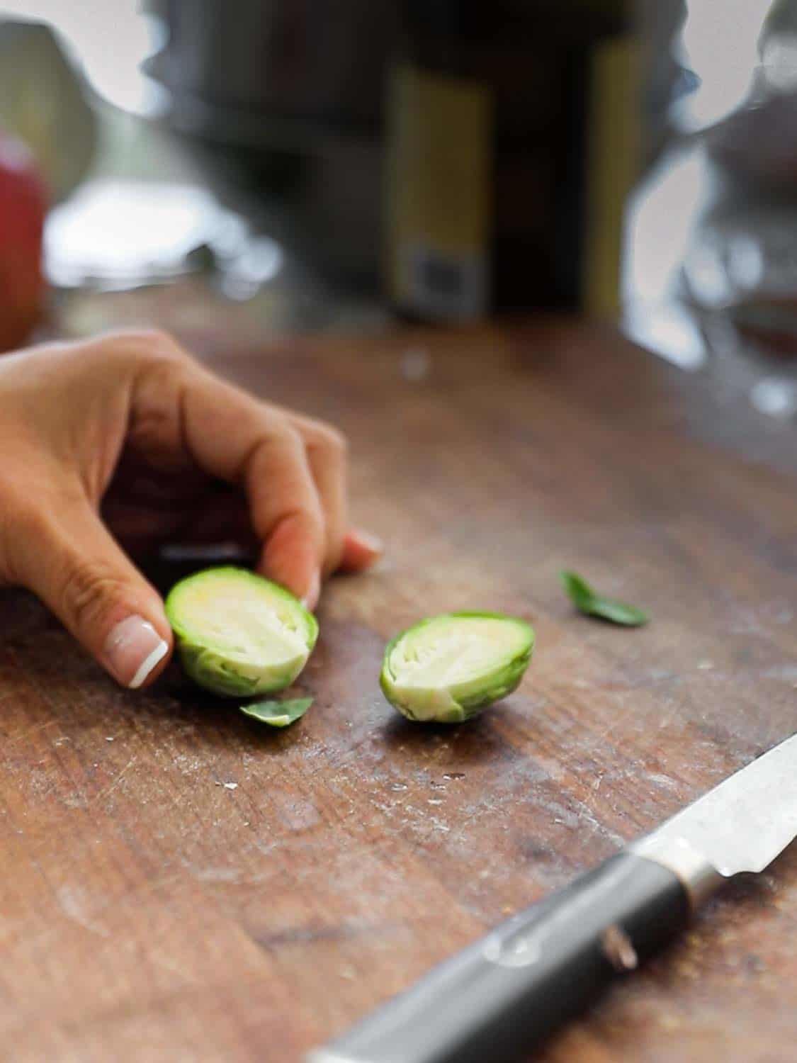 Tips on Making PERFECT Roasted Brussels Sprouts (Easy and Delicious)! 10 halving brussels sprouts