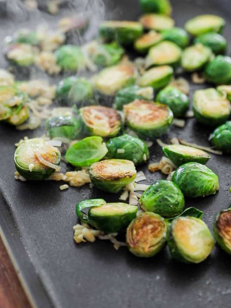 Tips on Making PERFECT Roasted Brussels Sprouts (Easy and Delicious)! 15 side view of roasted brussels sprouts