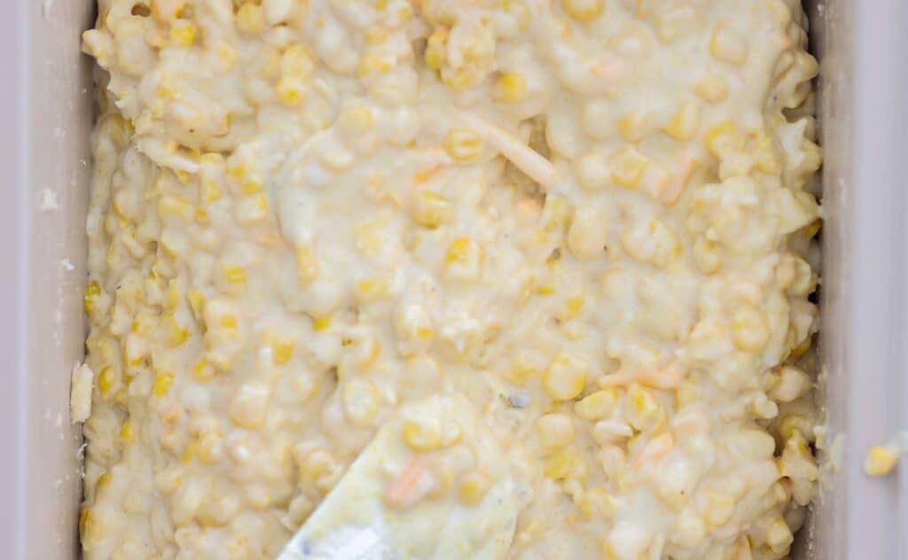 Easy and Delicious Cheesy Corn Soufflé (Dairy-Free and Gluten-Free Options). 13 image of cheesy corn souffle filling before oven