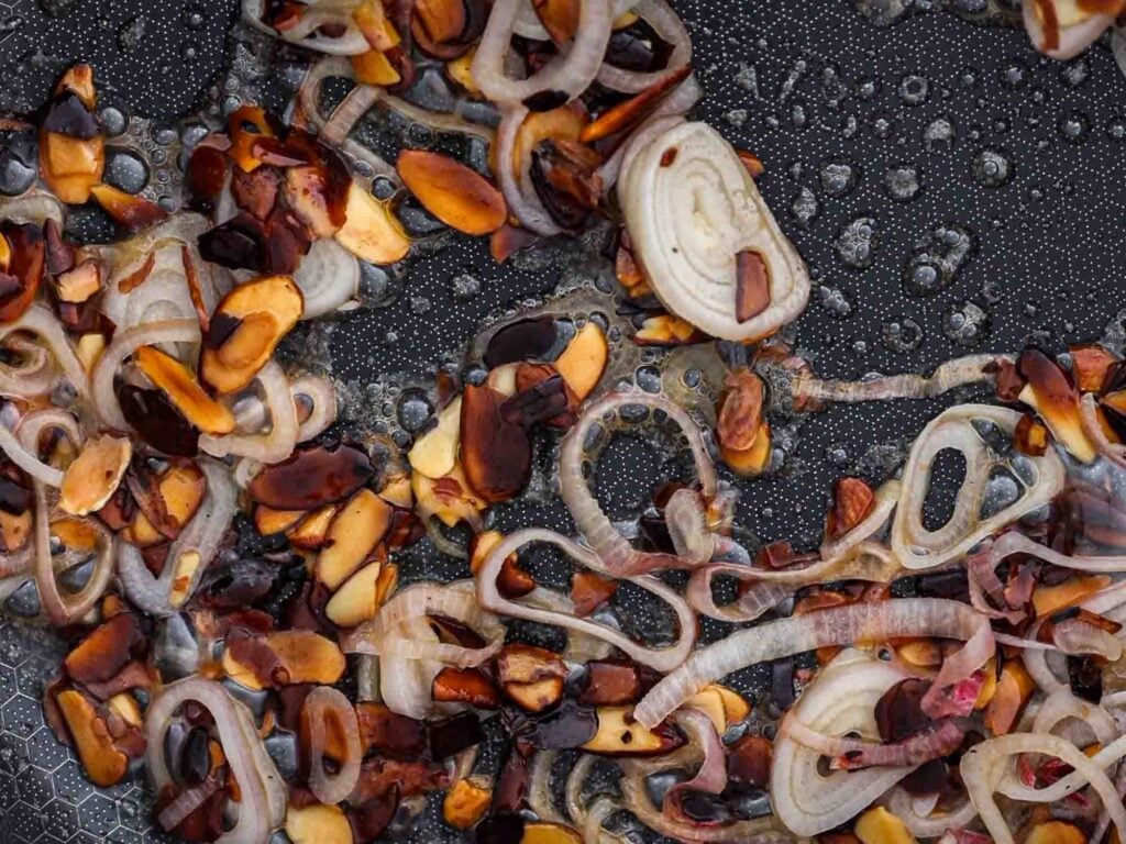 The BEST Green Beans with French Fried Shallots and Toasted Almonds. 13 shallots and almonds