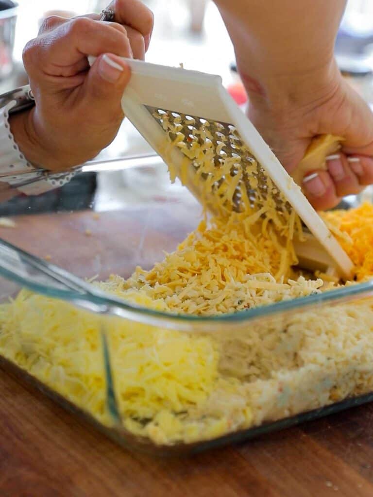 Easy and Delicious Cheesy Corn Soufflé (Dairy-Free and Gluten-Free Options). 5 grating vegan cheese