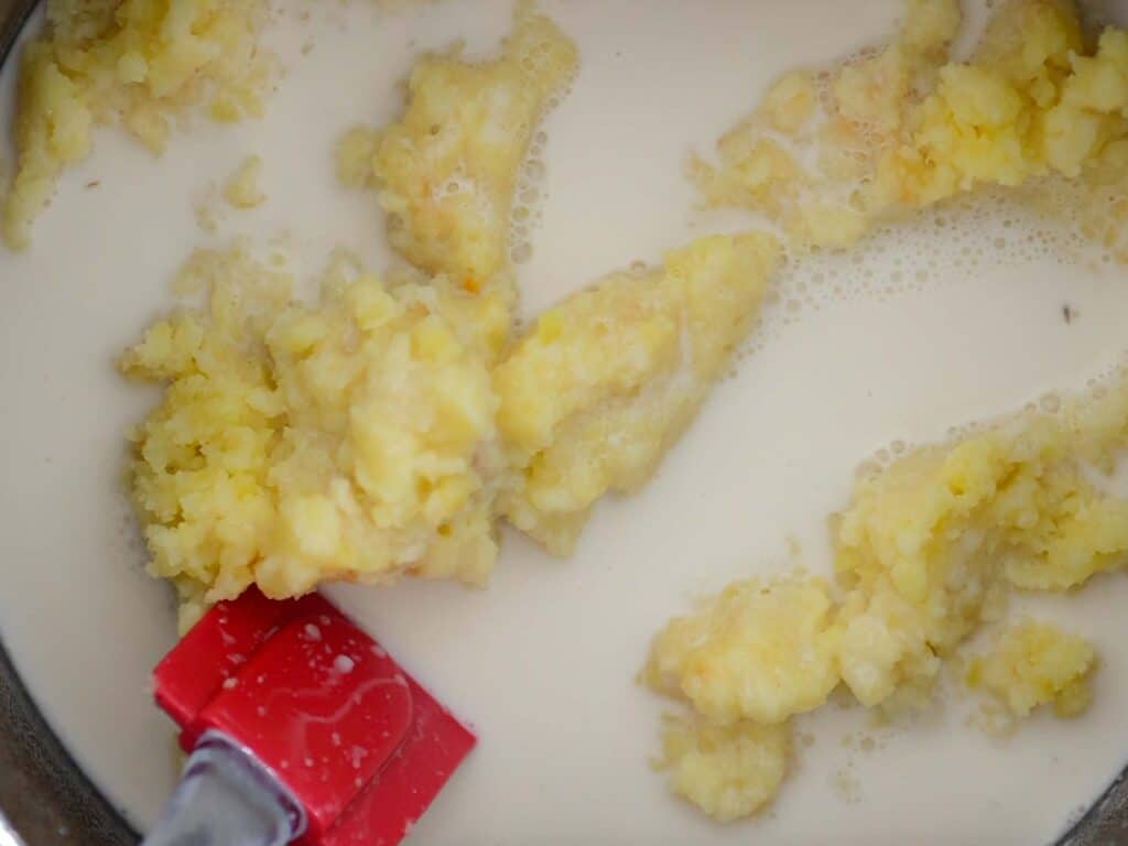 Tips on Making the BEST Creamy Mashed Potatoes (Dairy Free Option)! 15 adding milk to potatoes
