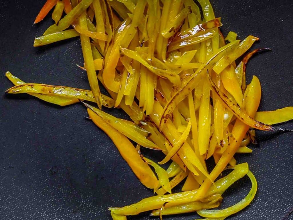 My Mom's Easy Vegetarian Japchae (Glass Noodles). 16 sauteed yellow bell pepper