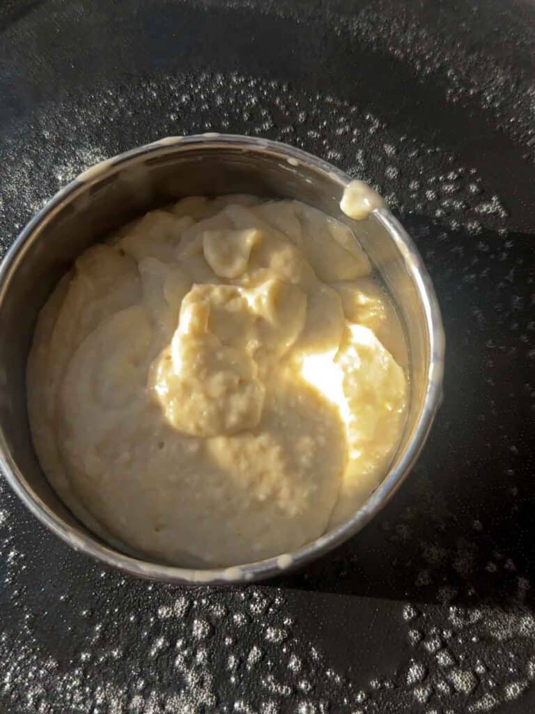 30-Minute Fluffy and Delicious Vegan Lemon Ricotta Pancakes. 24 adding batter to griddle using cookie cutter