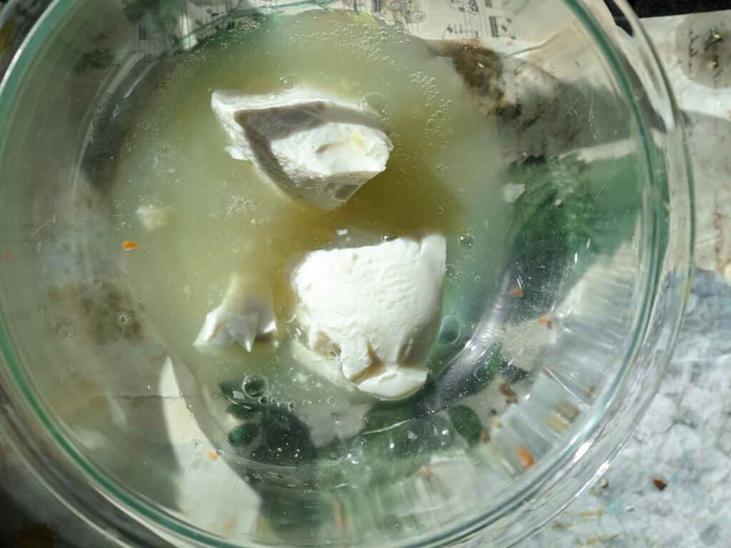 The BEST Vegan Carrot Cake Recipe - Not Too Sweet! 6 A glass bowl containing chunks of silken tofu submerged in aquafaba