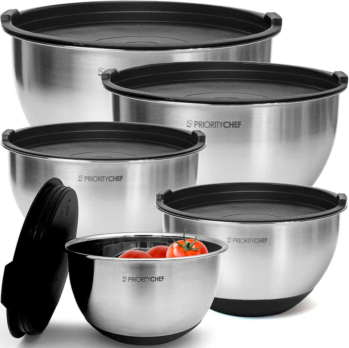 The Korean Vegan's 2025 VEGAN Holiday Gift GUIDE. 6 This holiday gift set features five stainless steel mixing bowls with black lids, proudly displaying the Priority Chef logo. Perfect for any Korean vegan recipe, the smallest bowl is filled with fresh tomatoes, adding a touch of vibrant color to your kitchen.