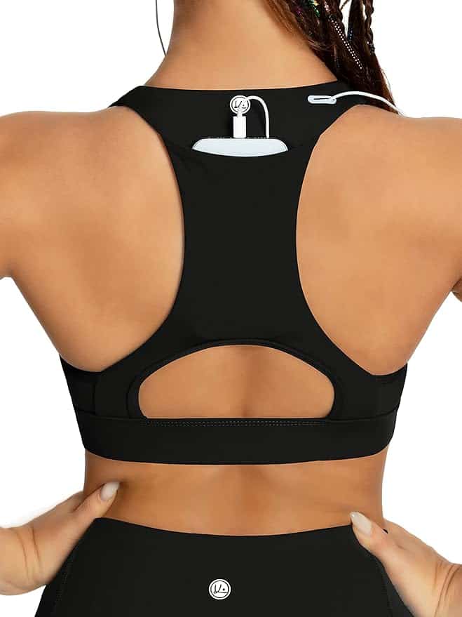 The Korean Vegan's 2025 VEGAN Holiday Gift GUIDE. 34 Back view of a person wearing a black sports bra with wired earphones tucked into the back strap. The strap has a small loop to hold the wires. A portion of the person's braided hair is visible.