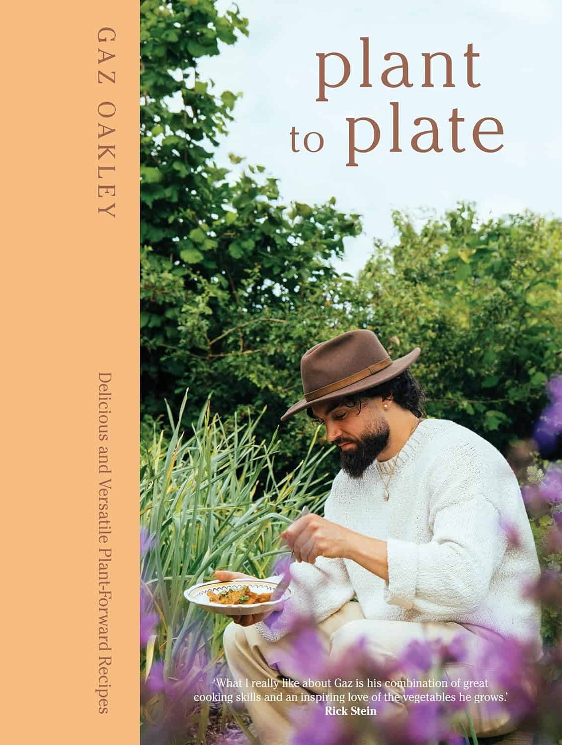 The Korean Vegan's 2025 VEGAN Holiday Gift GUIDE. 5 A man with a beard and brown hat sits outdoors in a garden, eating from a bowl. The book cover reads Plant to Plate by Gaz Oakley, featuring plant-based recipes—a perfect pick for vegan holiday gifts or anyone seeking a thoughtful gift guide. Lush greenery surrounds him.