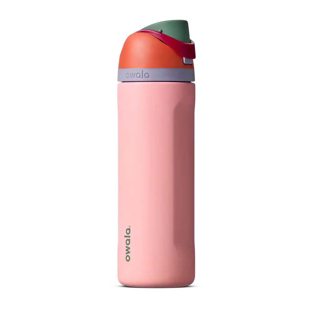 The Korean Vegan's 2025 VEGAN Holiday Gift GUIDE. 37 A pink Owala water bottle with a green and orange flip-top lid, a small grey band near the top, and the brand name “owala” printed vertically on the side—perfect for any Vegan Holiday Gift Guide.